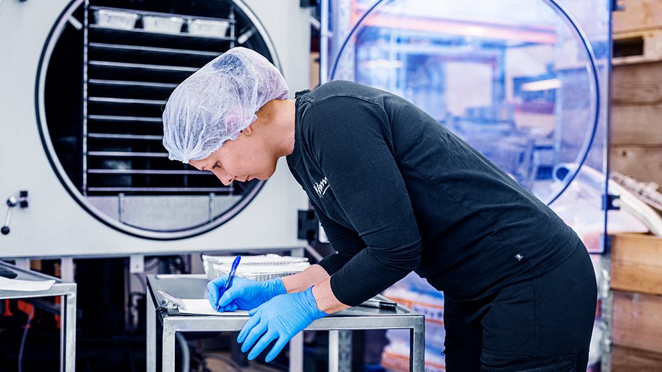 Woman standing in a research facility