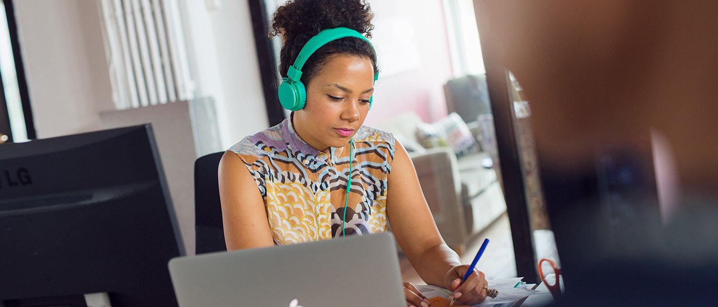 Woman listen to music while working