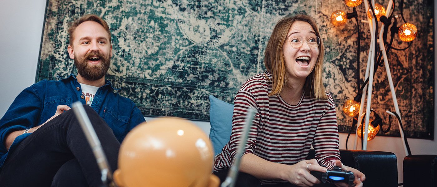 Two persons playing tv-games