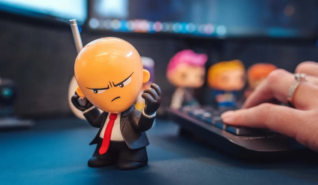 Small game character standing on table