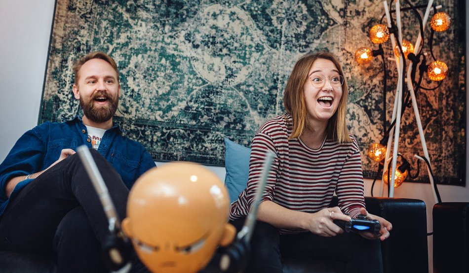 Two persons playing tv-games