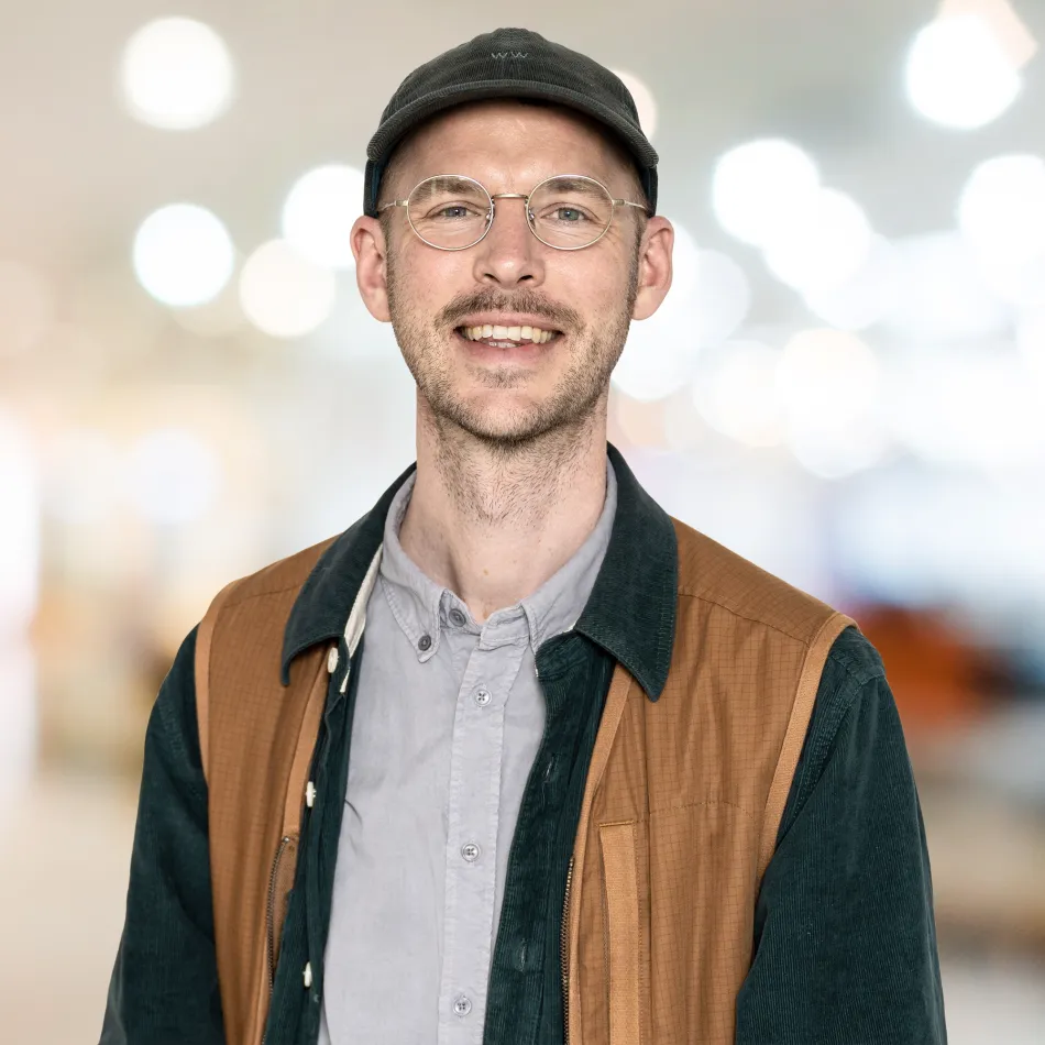 Man smiling in camera