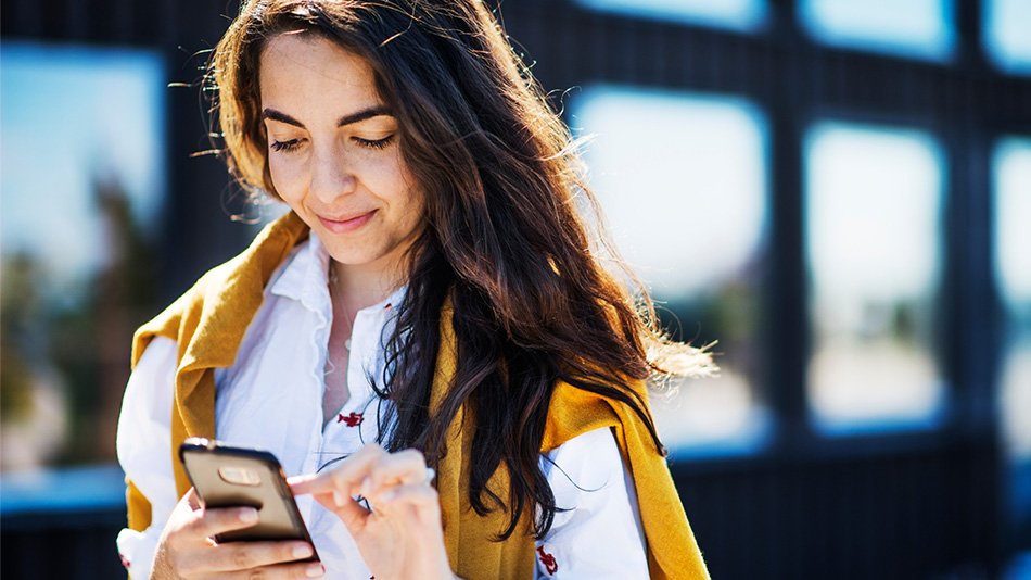 Woman interacting with phone