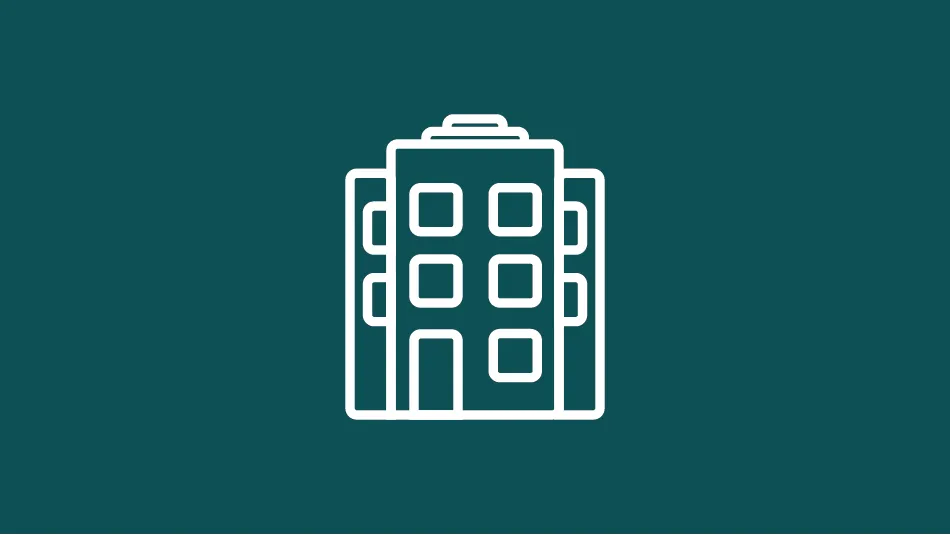 White icon of a offiebuilding on green background.
