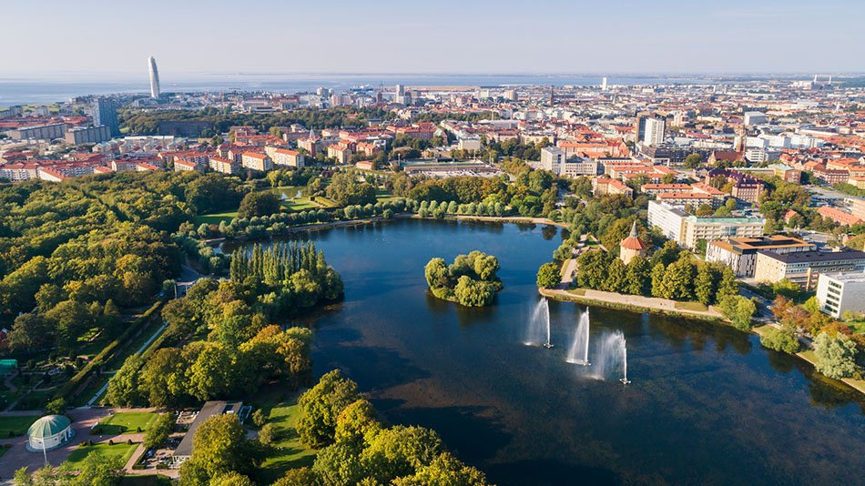 Drone image over Malmo city. Water, vegetation and citybuildings captured suring summer.